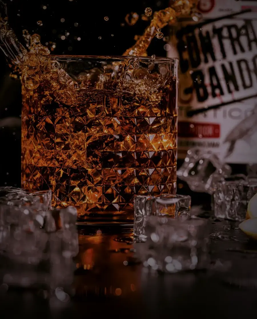 A dark spirit poured over ice — Khukuri rum, delivered across Kathmandu Valley by Raksi Hour.