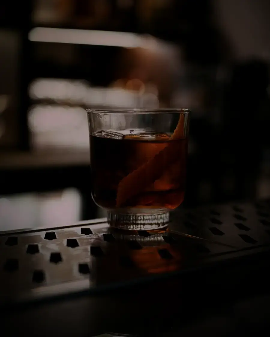 Whisky served over ice on a bar counter — Black Oak, delivered across Kathmandu Valley by Raksi Hour.