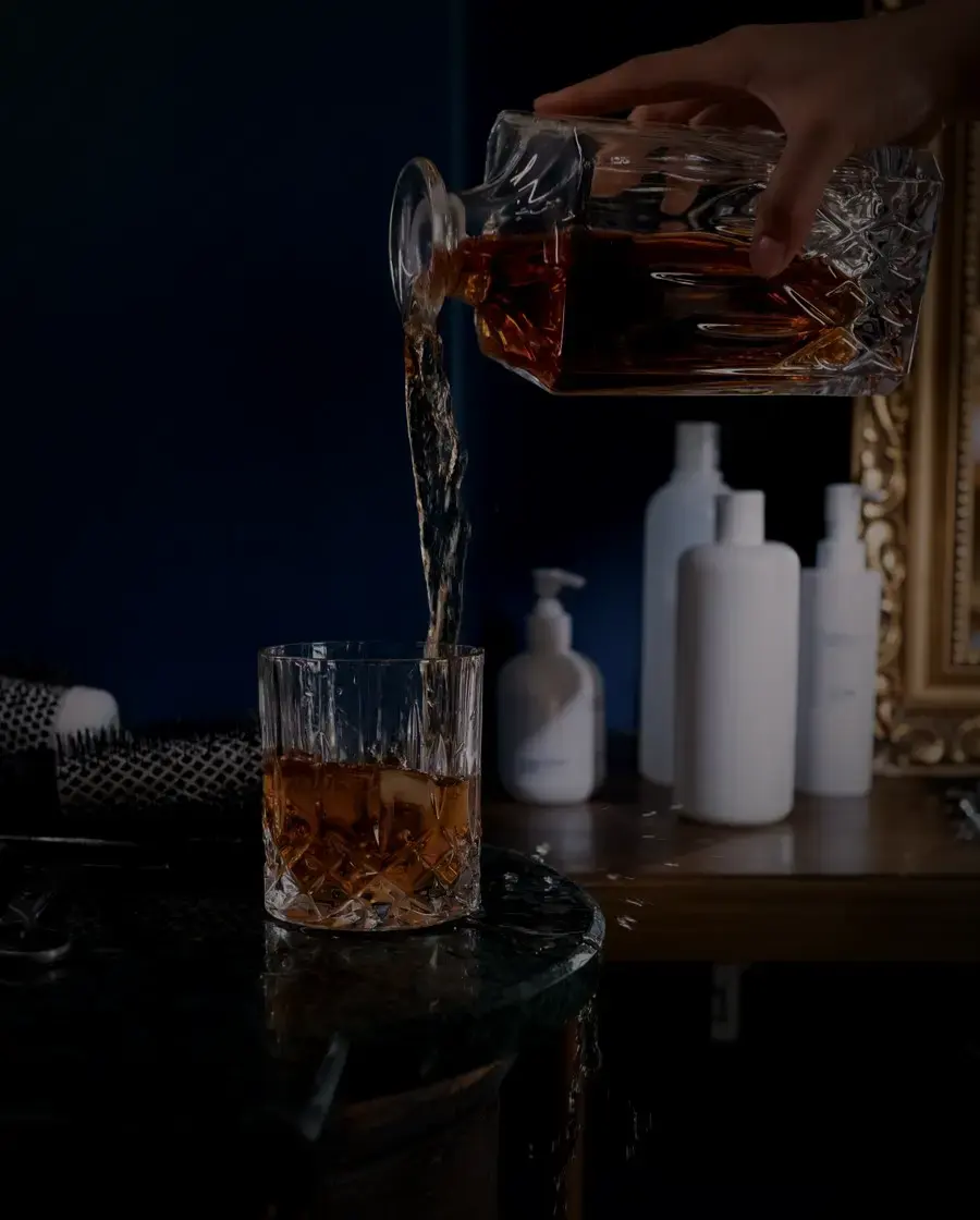 Whisky being poured into a glass — Mustang Gold whisky, delivered across Kathmandu Valley by Raksi Hour.